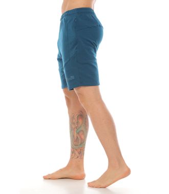 pantaloneta tipo jogger deportiva color petroleo para hombre parte lateral derecha