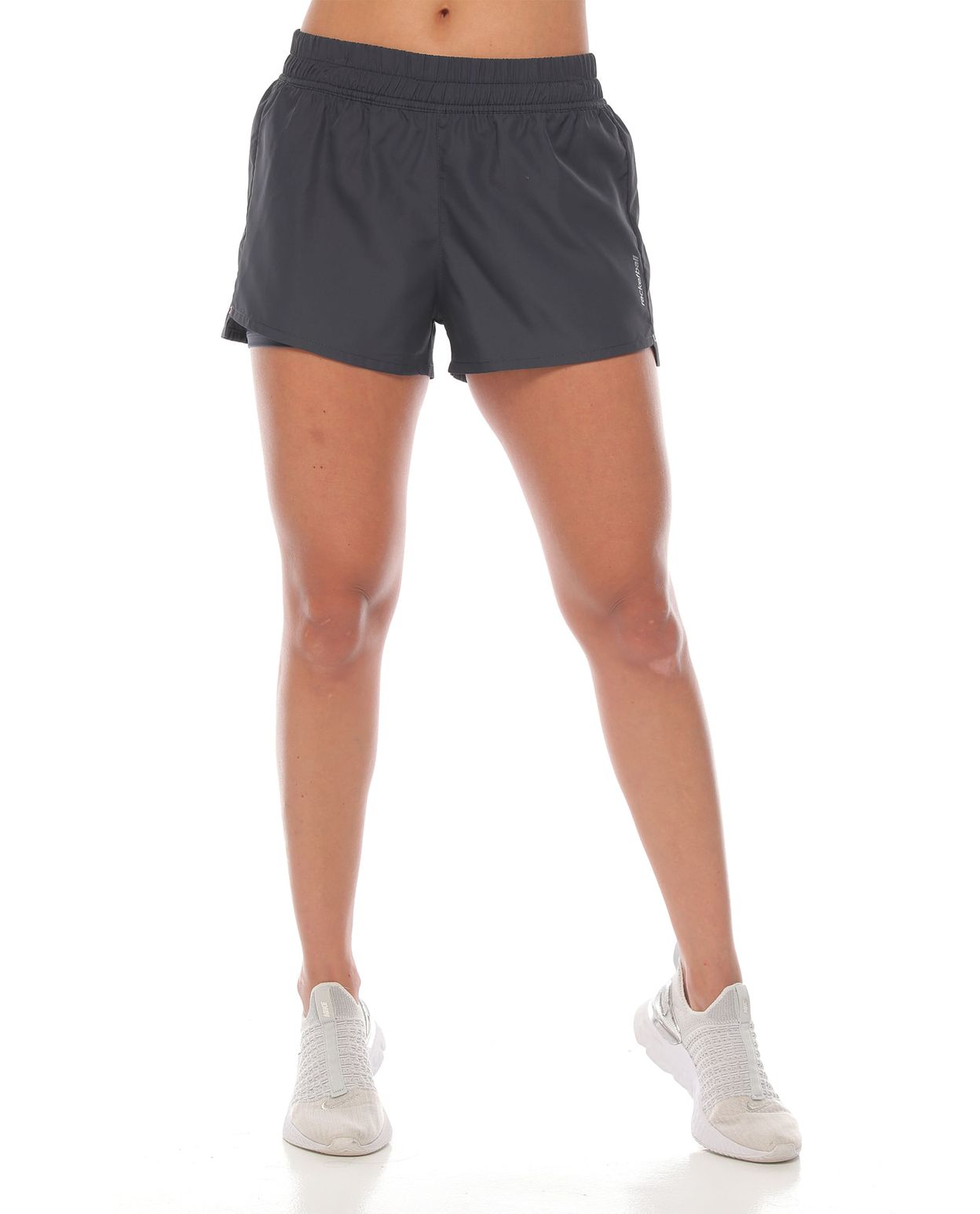 pantaloneta running deportiva color gris con fit interior para mujer